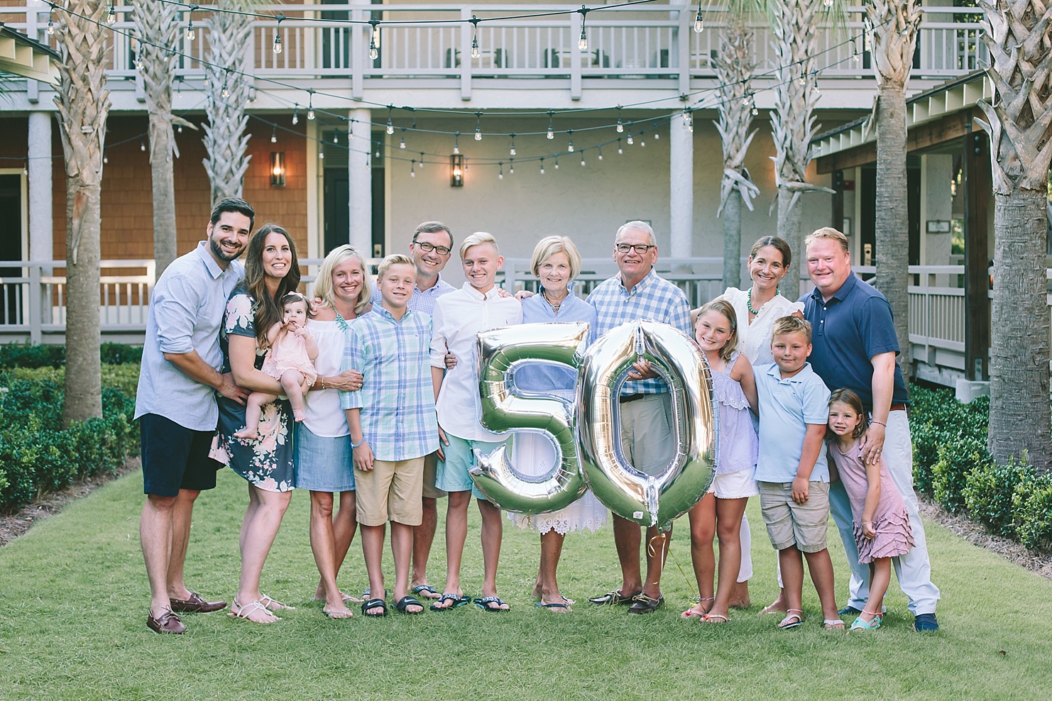 Family celebrating grandparents' 50th anniversary.